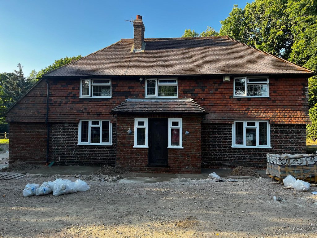 House in Uckfield after sandblasting, paint removed from the brick