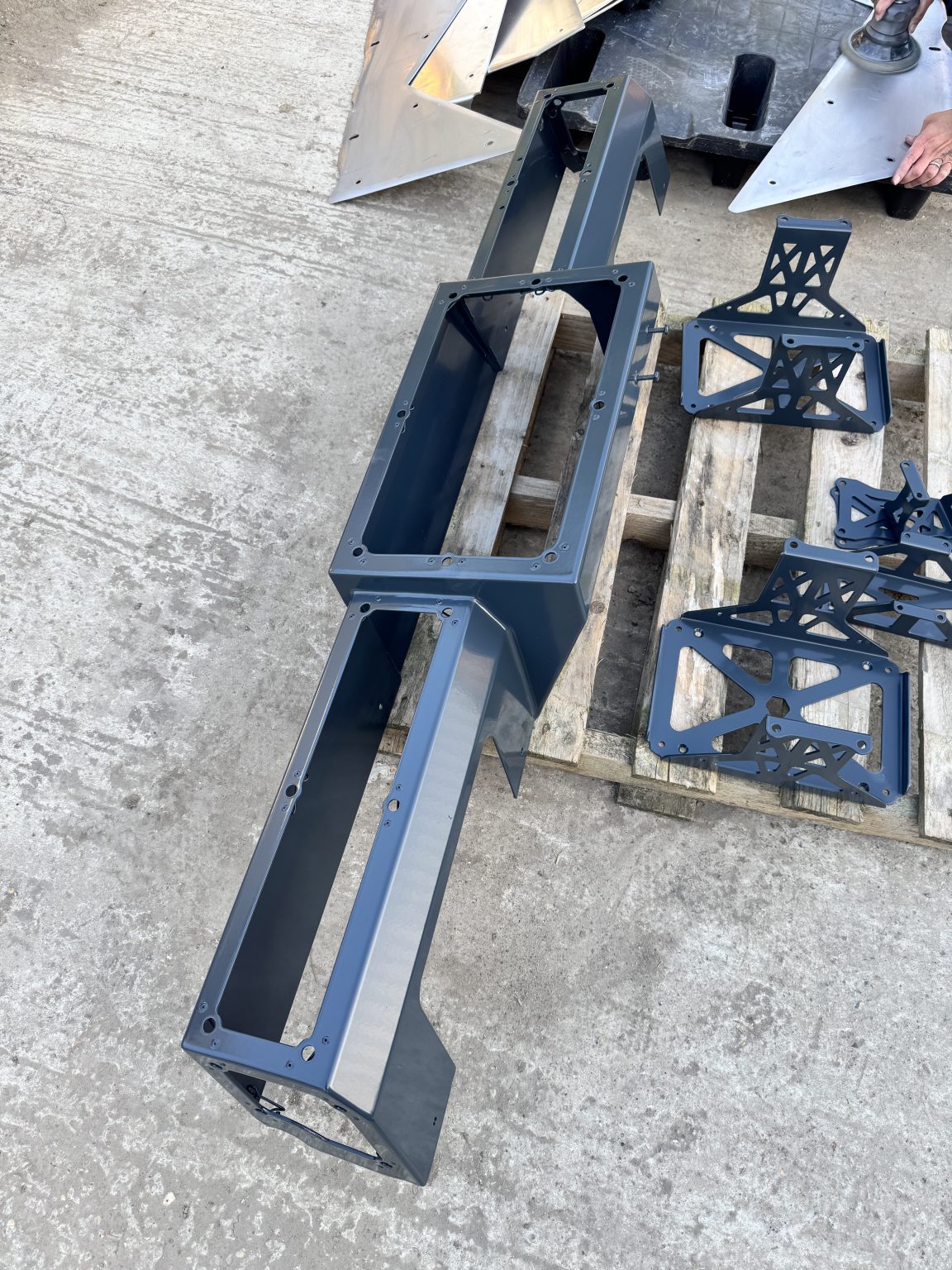 Blue powder coated steel frames and brackets
