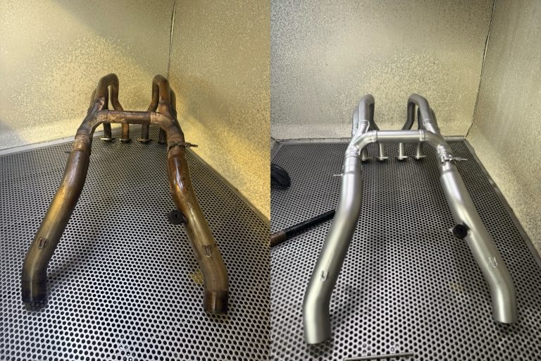 Before and after vapour blasting of a stainless motorcycle exhaust header by TB Blast Cleaning, East Sussex