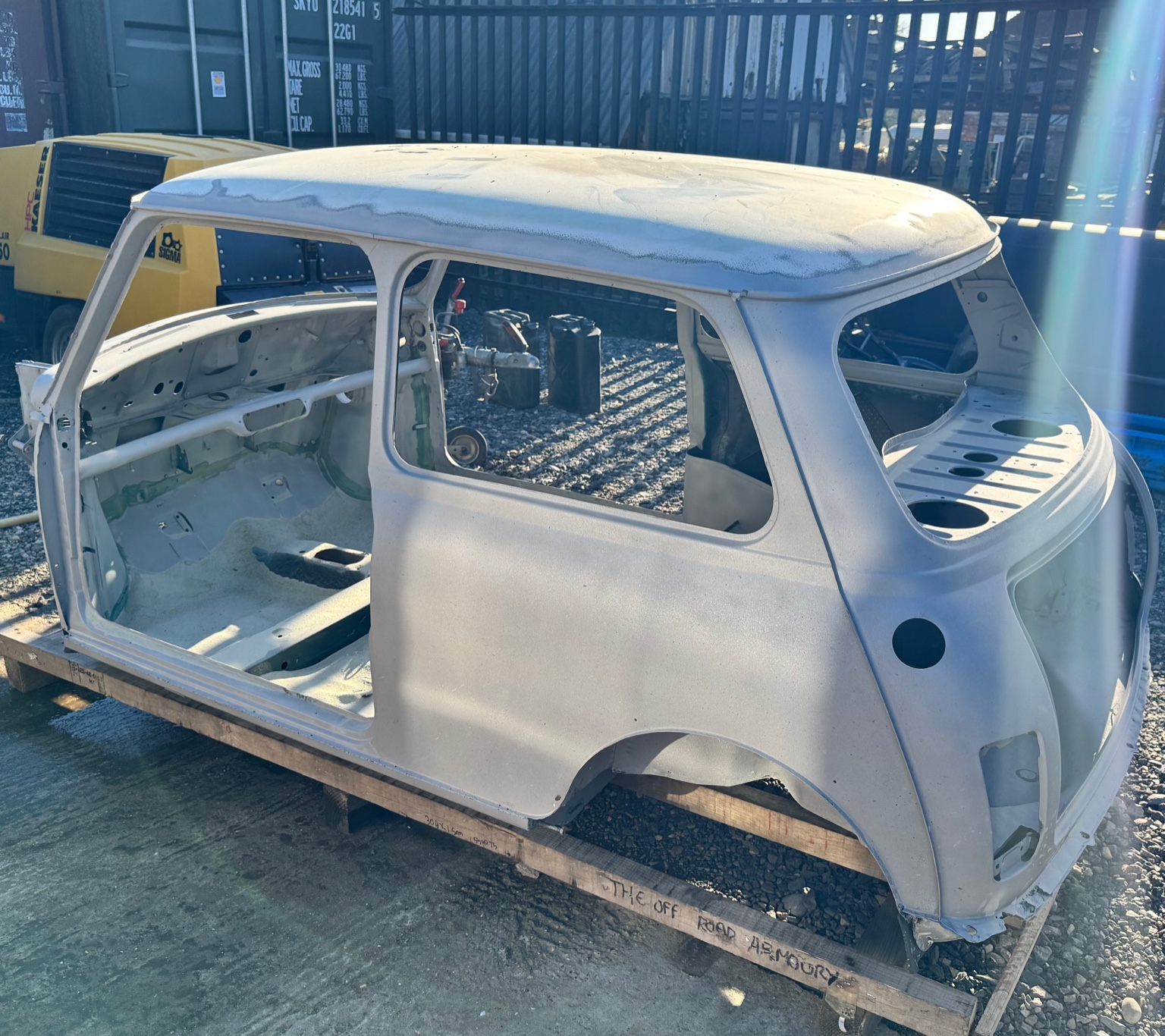 Sandblasted Classic Mini body shell prepared for restoration at TB Blast Cleaning in Hailsham, East Sussex.