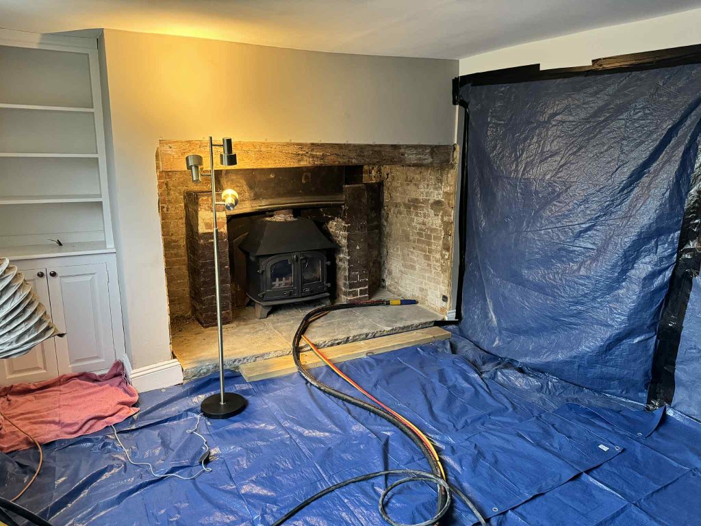 Brick fireplace before blasting