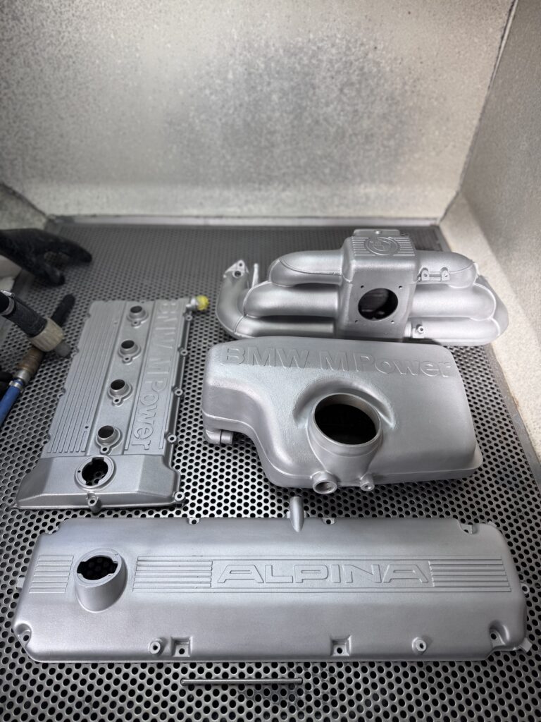 Vapour blasted BMW and Alpina engine covers