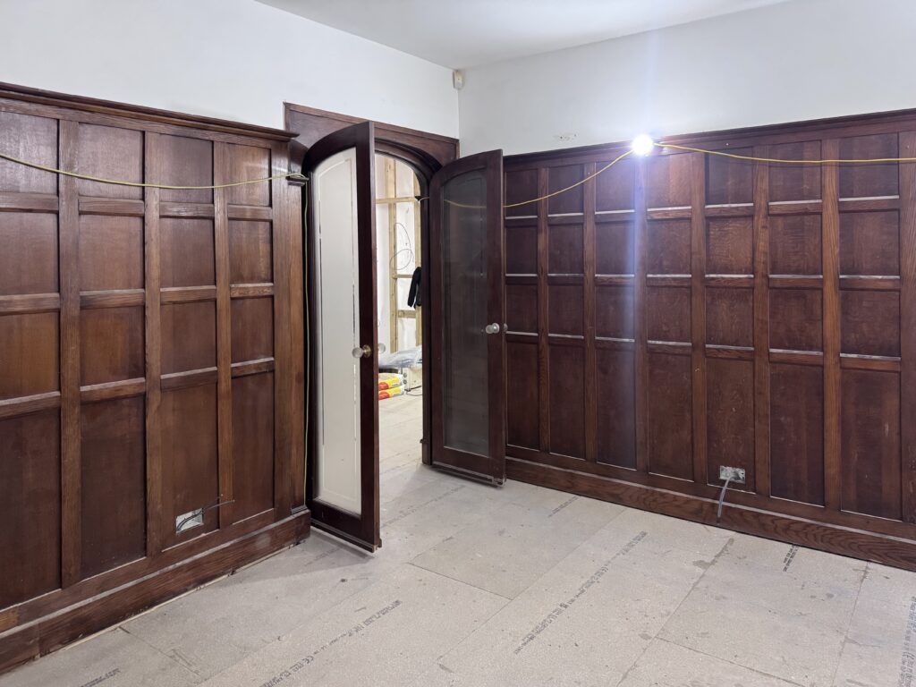 Dark oak veneer doors before soda blasting, Brighton
