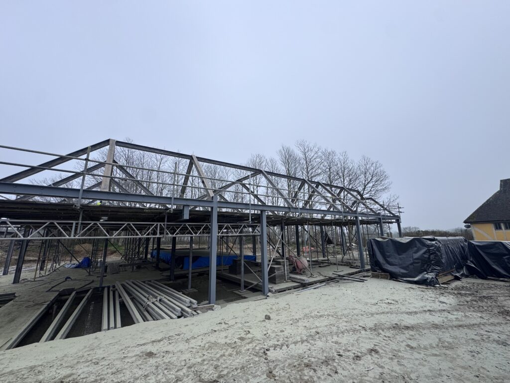 Steel portal frame on a building site