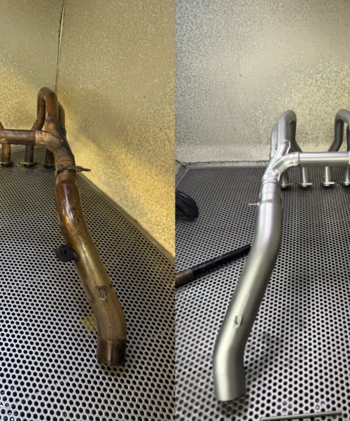 Before and after vapour blasting of a stainless motorcycle exhaust header by TB Blast Cleaning, East Sussex